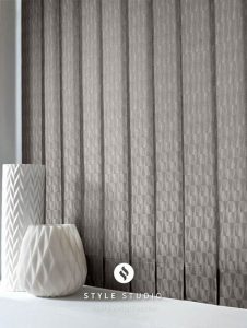 grey patterned vertical blinds