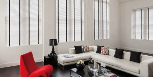 white blinds with black tape on sides