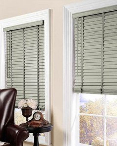 grey wooden blinds in lounge