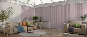 pink vertical blinds in a conservatory