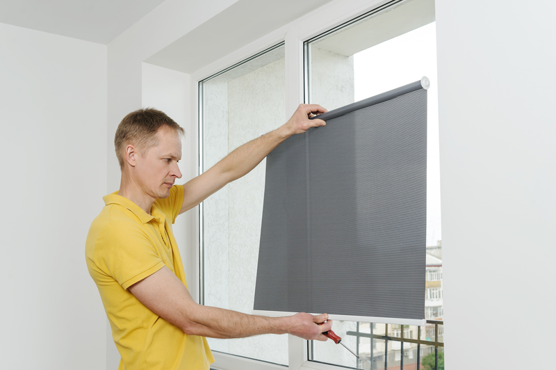 man with blinds