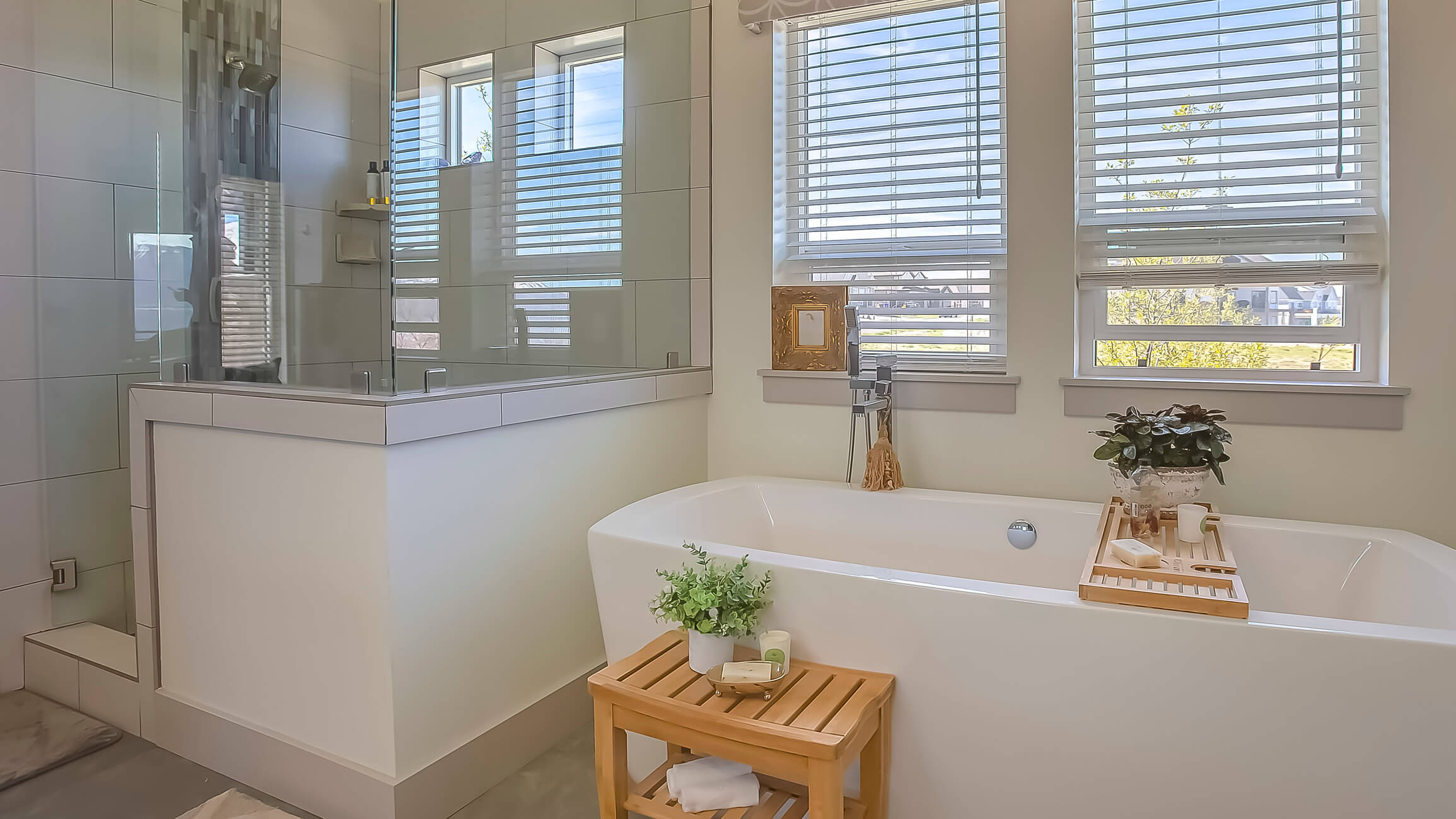 Modern bathroom with white wooden blinds